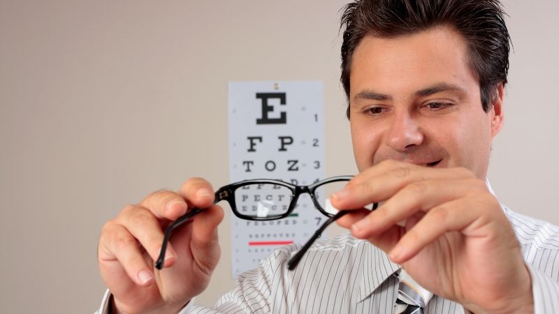 International vision expo west 2020 las vegas | optometrist examining pair eyeglasses frames | international vision expo west 2020