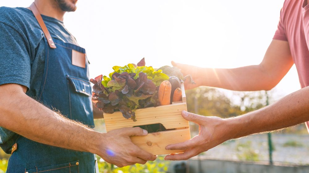 Farmer selling his organic produce on a sunny day | supplyside west trade show & conference 2020 | featured