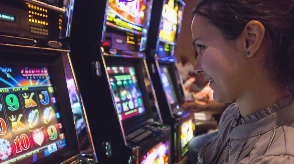 Global gaming expo 2020 las vegas | concentrated girl playing slot machines | global gaming expo 2020 | g2e (canceled)