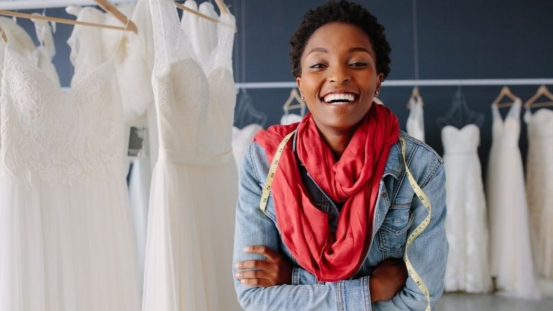 Portrait african female bridal store owner | wedding mba convention 2021