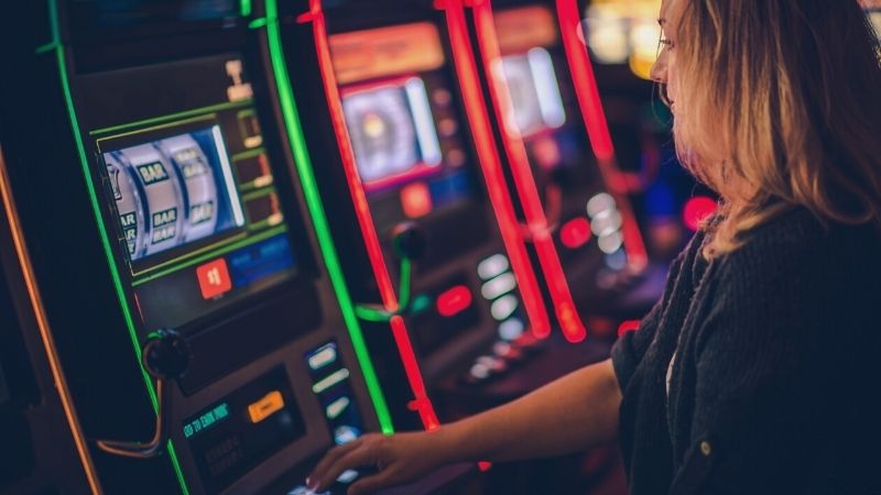 Global Gaming Expo 2020 Las Vegas | slot machine casino playing caucasian woman | Global Gaming Expo 2020 | G2E (CANCELED)