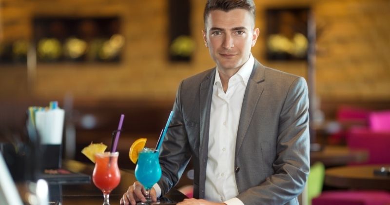 Portrait handsome young man standing bar | nightclub and bar show 2021